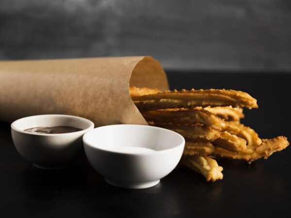 O que faz um churros chegar perfeito mesmo depois da viagem